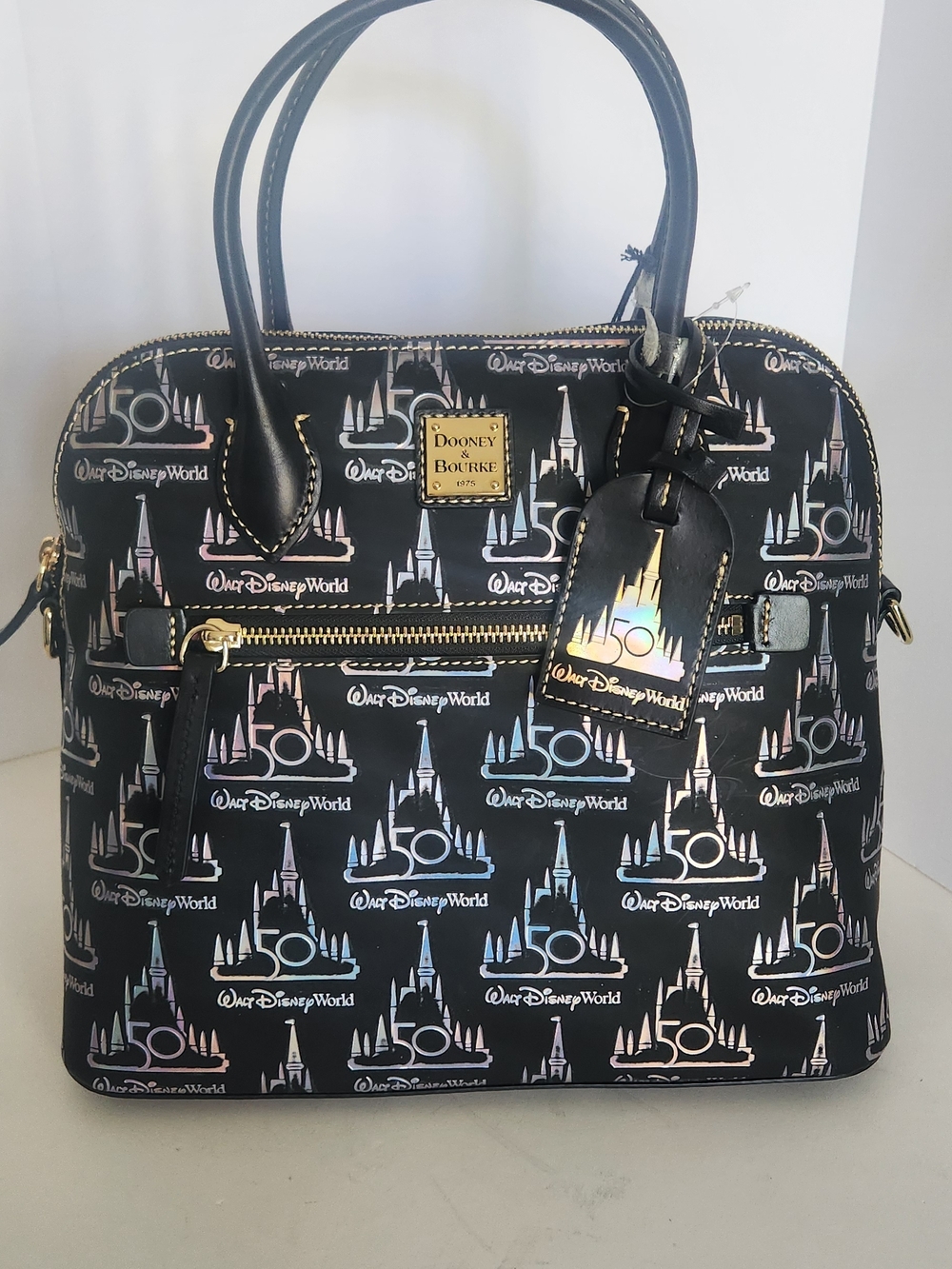 Dooney & Bourke Black Satchel with Iridescent Castle Print